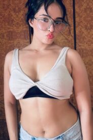 kaushiki-rathore-in-a-tank-top-and-denim-shorts-v0-kr2omwzasbze1-1